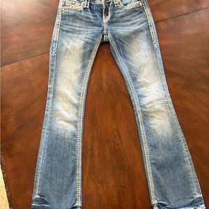 Rock Revival Blue Boot Cut Jeans with Faded Vintage Look